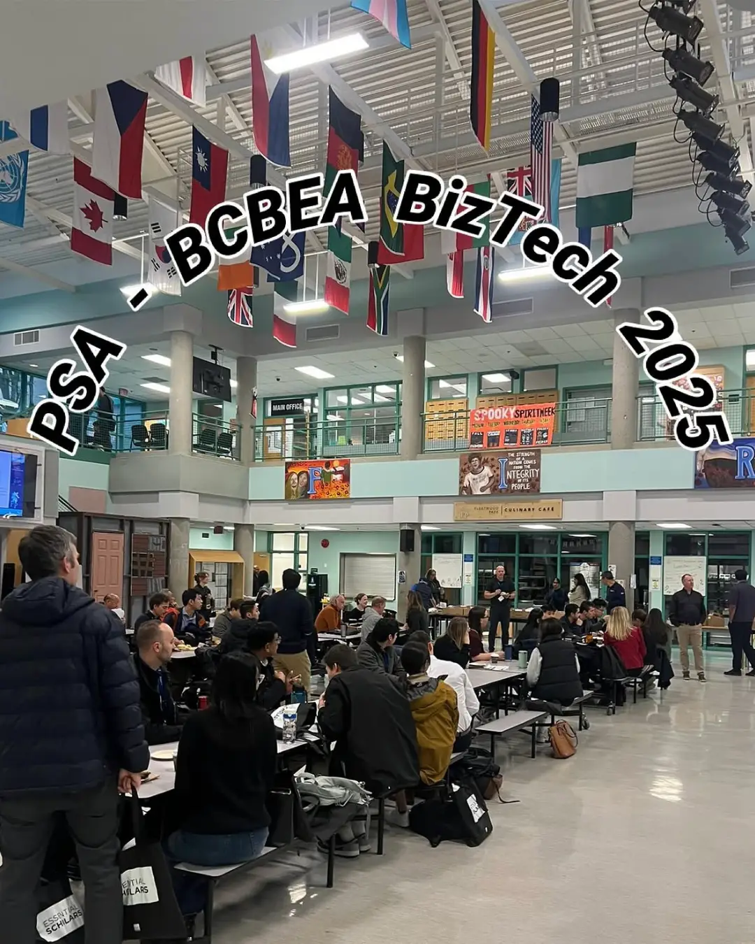 A photo of a cafeteria meeting of business teachers for Biztech 2025.